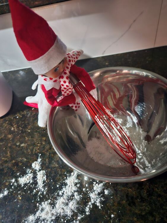 Elf on shelf stirring up stuff