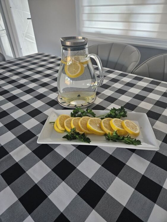 Down to the wire water pitcher with lemons centerpiece